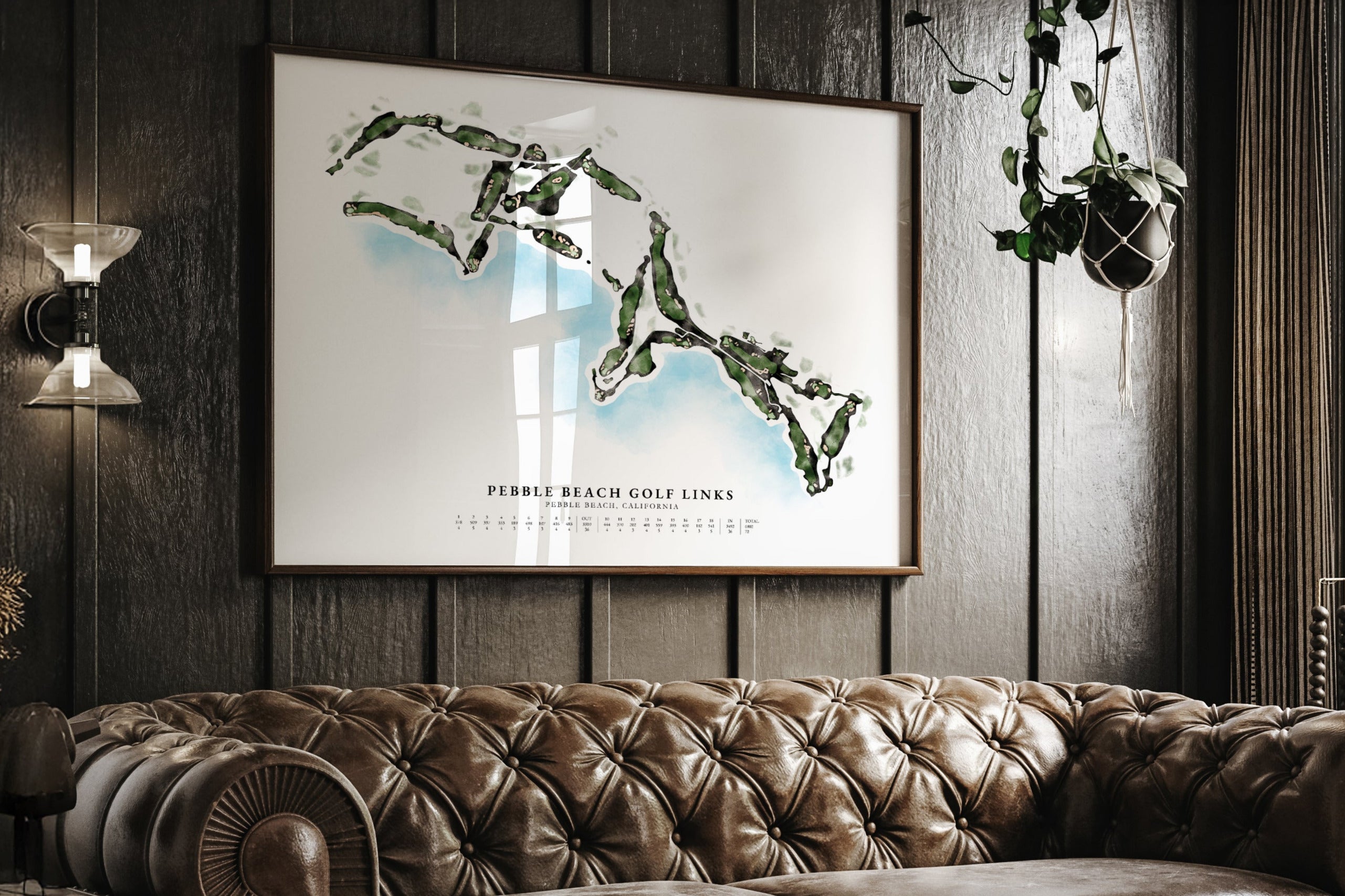 Decorative wall art above a brown leather sofa in a stylish room.